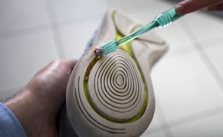 clean the soles of your shoes