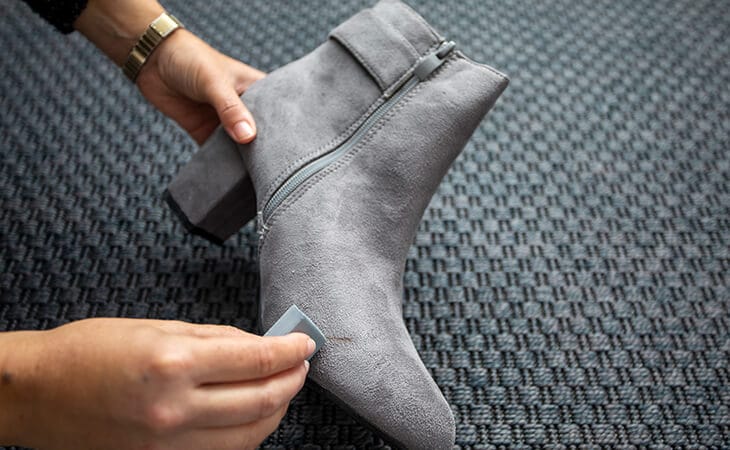 use a suede rubber or pencil eraser